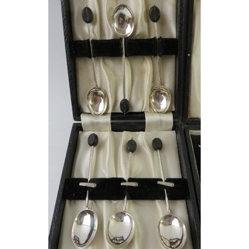 386 - Two cased sets of silver coffee bean teaspoons. Hallmarked for Birmingham 1925 and Sheffield 1969 Ap... 