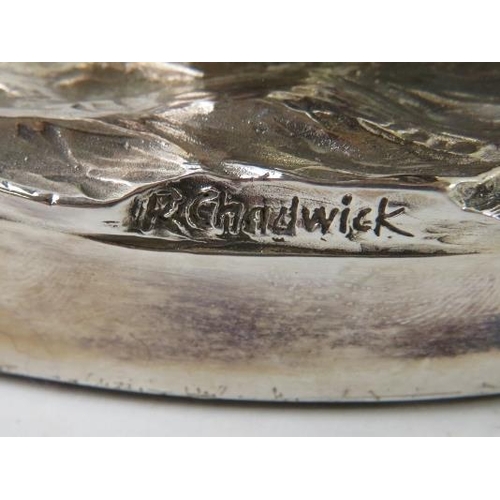 389 - A hallmarked silver model of a fly fisherman, signed R Chadwick. Hallmarked for Sheffield 1986, make... 