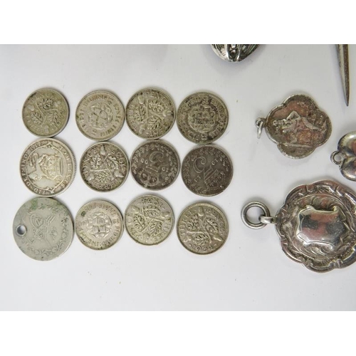 390 - A quantity of broken and damaged hallmarked silver items and silver coinage. Approx gross weight 154... 