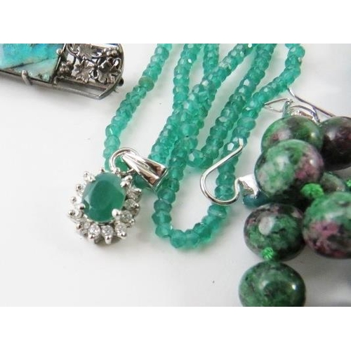 432 - A long bead necklace of ruby and zoisite beads 135cm long; a faceted chrysoprase green bead necklace... 