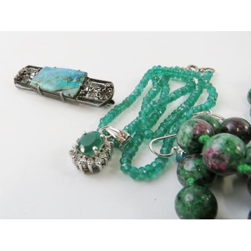 432 - A long bead necklace of ruby and zoisite beads 135cm long; a faceted chrysoprase green bead necklace... 