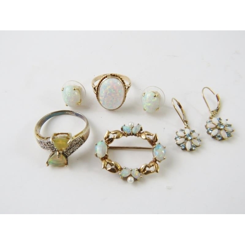 438 - A 9ct yellow gold brooch set with opals and seed pearls; and other opal or synthetic  opal items to ... 