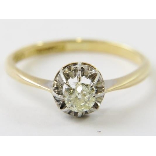 442 - A single stone diamond ring claw set in illusion setting in white and yellow metals, shank stamped ‘... 