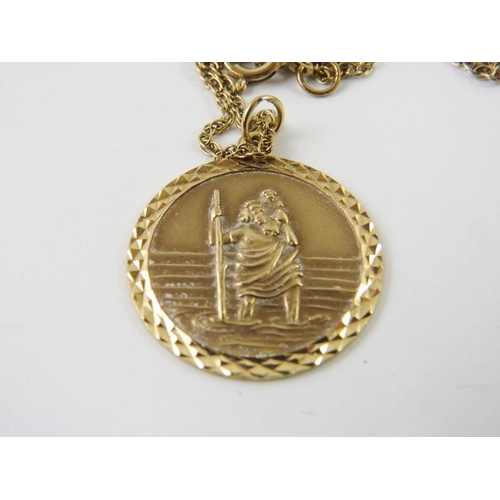 467 - A 9ct yellow gold St Nicholas pendant and yellow metal long rope twist chain stamped 375, pendant 25... 