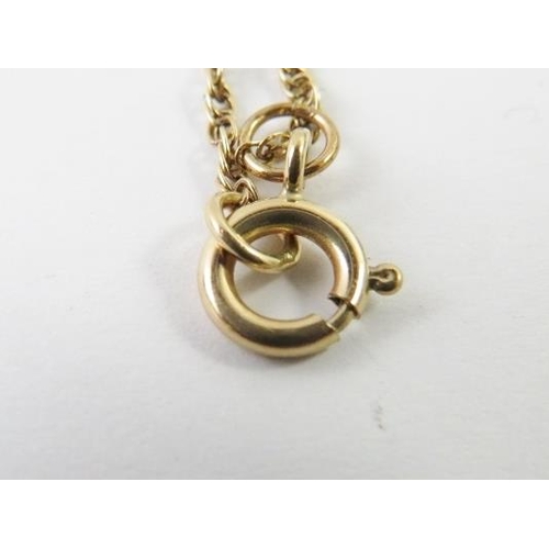 467 - A 9ct yellow gold St Nicholas pendant and yellow metal long rope twist chain stamped 375, pendant 25... 