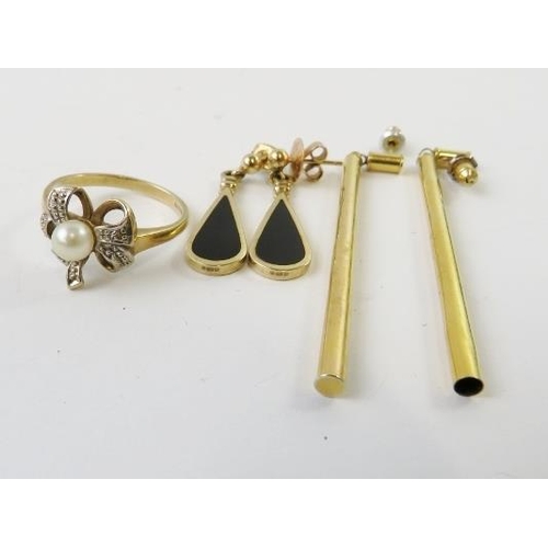 472 - A pair of yellow metal hollow tubular design drop earrings stamped 375, 6cm long; and another pair o... 