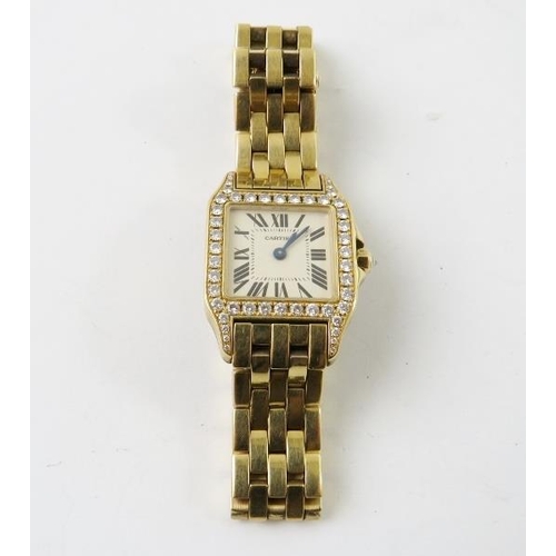 485 - Cartier - A lady’s 18ct gold and diamond Santos Demoiselle quartz bracelet watch, c.2009, model 2699... 