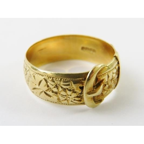 487 - An 18ct yellow gold buckle or belt ring all over engraved with foliate panels, hallmarked London 190... 