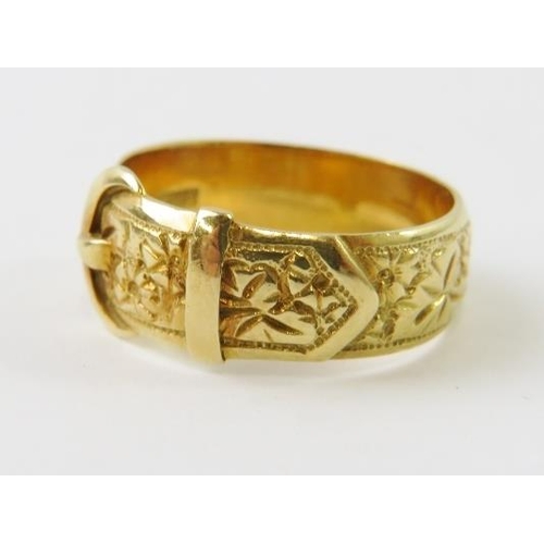 487 - An 18ct yellow gold buckle or belt ring all over engraved with foliate panels, hallmarked London 190... 