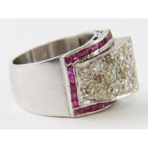 488 - A retro 1940’s diamond and ruby Tank ring, with a raised panel pave set with old round cut diamonds ... 