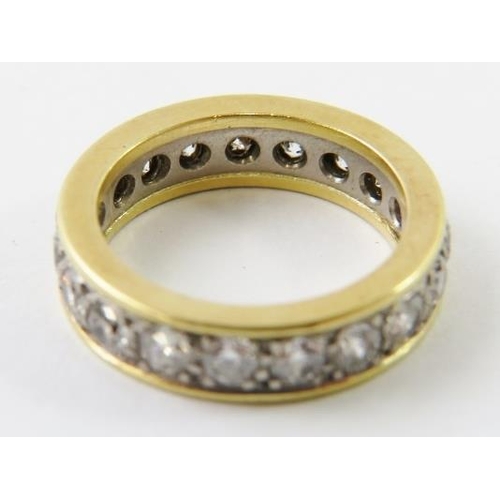 492 - A diamond full eternity ring, the 19 round brilliant cut diamonds approx 3mm diameter estimated G/H ... 