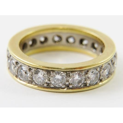 492 - A diamond full eternity ring, the 19 round brilliant cut diamonds approx 3mm diameter estimated G/H ... 