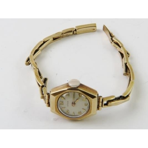 500 - A 9ct yellow gold Omega lady’s cocktail watch,  mechanical movement, with expanding 9ct yellow gold ... 