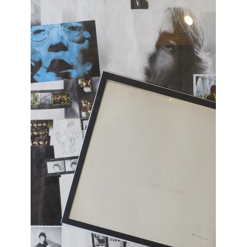 510 - A framed and glazed montage of the Beatles White Album.  Number 0166388. 57 x 56cms (approx).
Condit... 