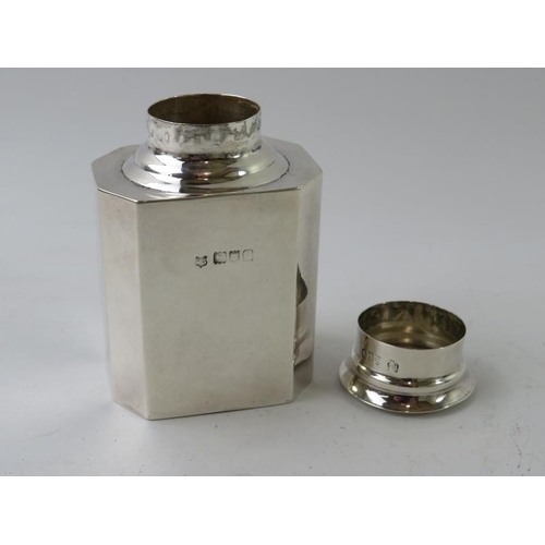 57 - A n octagonal Edwardian silver tea caddy of plain form, hallmarked for London 1906, maker Robert Ste... 