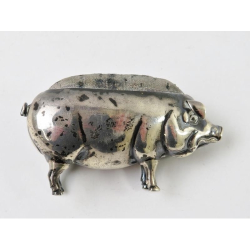 67 - A silver Edwardian pin cushion in the form of a pig, hallmarked for Birmingham 1906, maker Adie & Lo... 