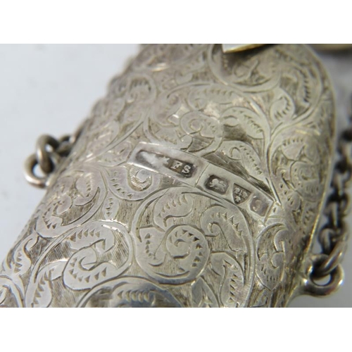 68 - A silver Edwardian chatelaine spectacle case with belt hook, ornately engraved. Hallmarked for Chest... 