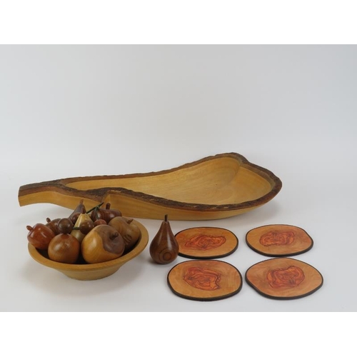 74 - A group of modern turned and carved wood items. Comprising two bowls, four coasters and group of tur... 