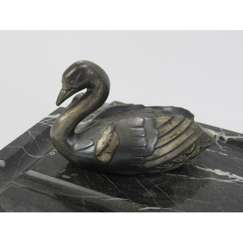 9 - An Art Deco marble desk tidy mounted with swan and inkwell, early 20th century. With ceramic ink wel... 