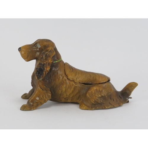 98 - An Austrian novelty cold painted metal hound dog inkwell, early/mid 20th century. 15.5 cm length. 
C... 