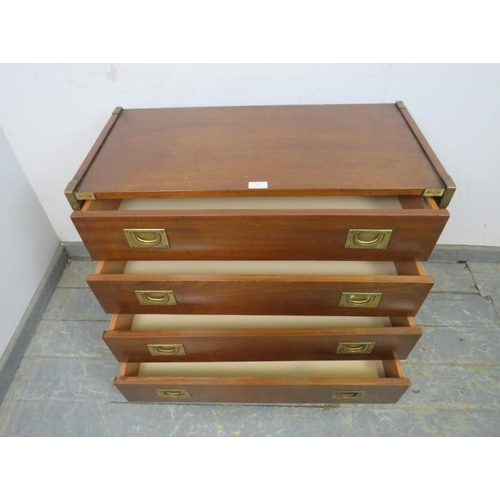 704 - A vintage mahogany brass mounted military style chest, housing four long drawers with recessed brass... 