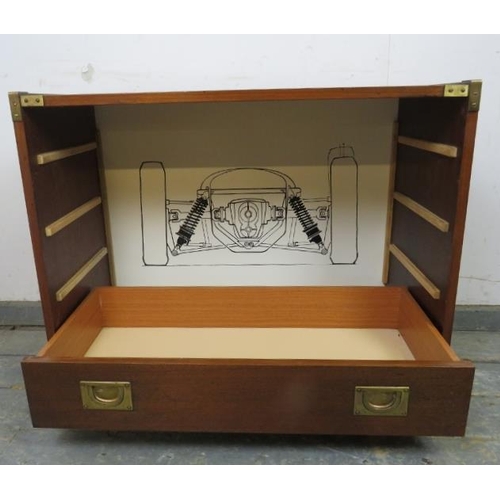 704 - A vintage mahogany brass mounted military style chest, housing four long drawers with recessed brass... 