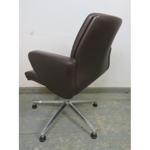 705 - A mid-century style swivel desk chair, upholstered in buttoned brown leather, on cast aluminium supp... 