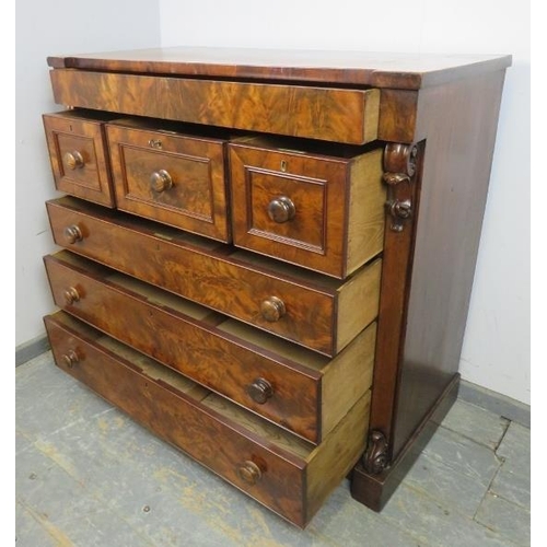 713 - A good 19th century flame mahogany reverse breakfront Scottish chest, housing a long blind drawer ab... 