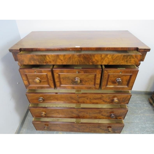 713 - A good 19th century flame mahogany reverse breakfront Scottish chest, housing a long blind drawer ab... 