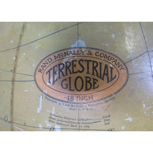 718 - A turn of the century 18” floorstanding library globe by Rand McNally & co, the meridian with monthl... 