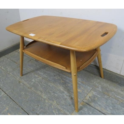 723 - A mid-century elm & beech Windsor butler’s tray table by Ercol, the top with pierced handles to eith... 