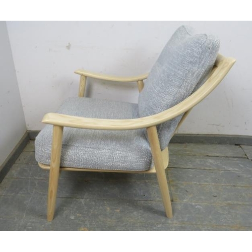 733 - A contemporary Marino lounge chair by Ercol, the bleached ash frame with loose cushions upholstered ... 