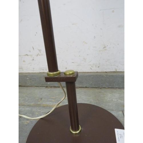 737 - A mid-century Danish floor-standing reading lamp, the height adjustable bronzed column on a circular... 