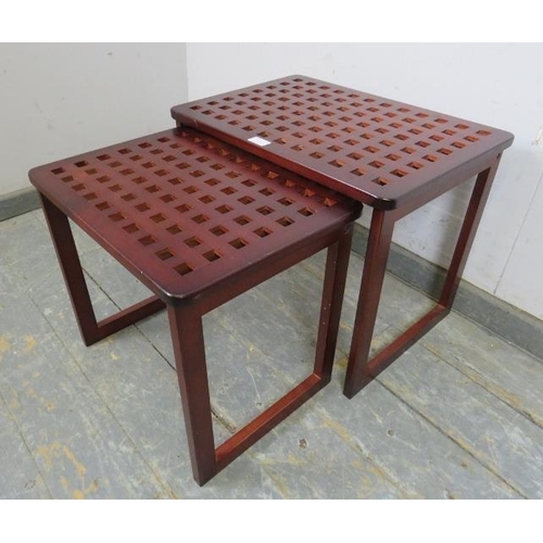 738 - Two vintage nesting coffee tables, the lattice tops on rail supports. 
H43cm W54cm D37cm approx.
Con... 