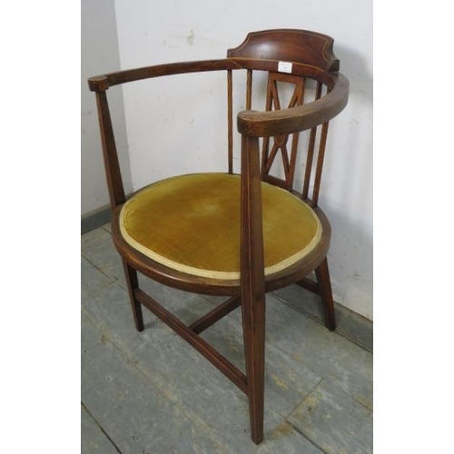 743 - An Edwardian mahogany tub chair strung with satinwood, upholstered in mustard velvet material, on ta... 