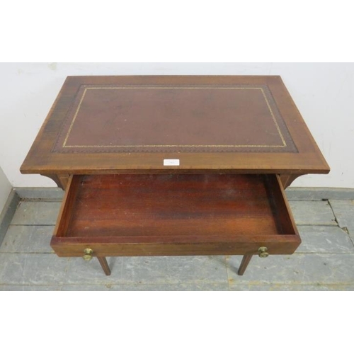 744 - An Edwardian mahogany writing table, cross-banded and strung with satinwood and boxwood, the top wit... 