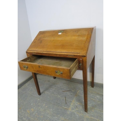 758 - A George III fruitwood bureau, the fall front opening onto a fitted interior with central document s... 