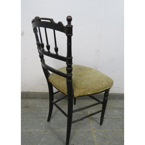 763 - A Napoleon III ebonised side chair, the curved back with ball finials and turned spindles, retaining... 