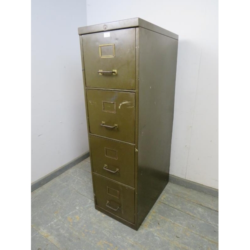 765 - A vintage steel filing cabinet painted khaki green, housing four deep drawers with brass handles and... 