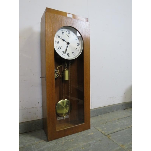 781 - An Art Deco Period light oak cased electric factory master clock, the brushed steel dial with Arabic... 