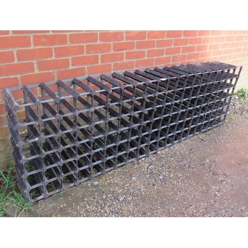 791 - A large vintage galvanized steel and wood wine rack. Holds 120 bottles. 
H60cm W192cm D23cm approx.
... 