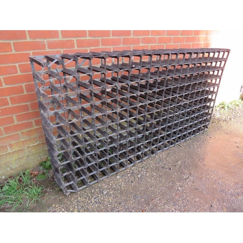 792 - A large vintage galvanized steel and wood wine rack. Holds 200 bottles. (a/f).
H99cm W192cm D23cm ap... 