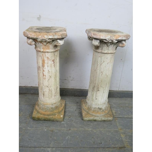 817 - A pair of 19th century terracotta Corinthian columns/plant stands. 
H69cm W25cm D25cm approx.
Condit... 