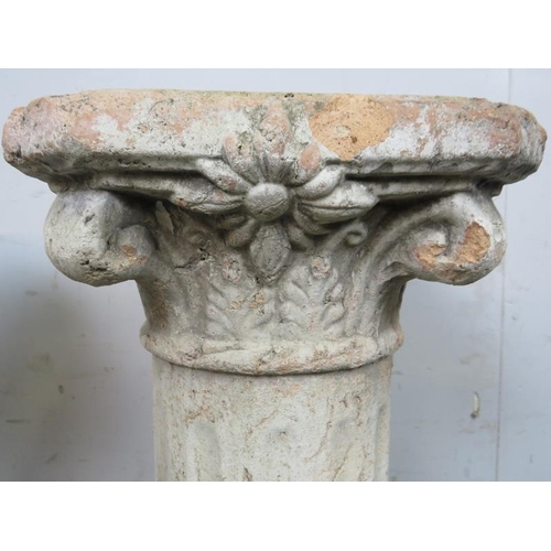 817 - A pair of 19th century terracotta Corinthian columns/plant stands. 
H69cm W25cm D25cm approx.
Condit... 