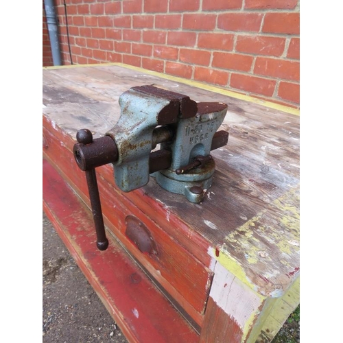 820 - An antique pine painted work bench, with vice fitted and housing one long drawer with scalloped hand... 