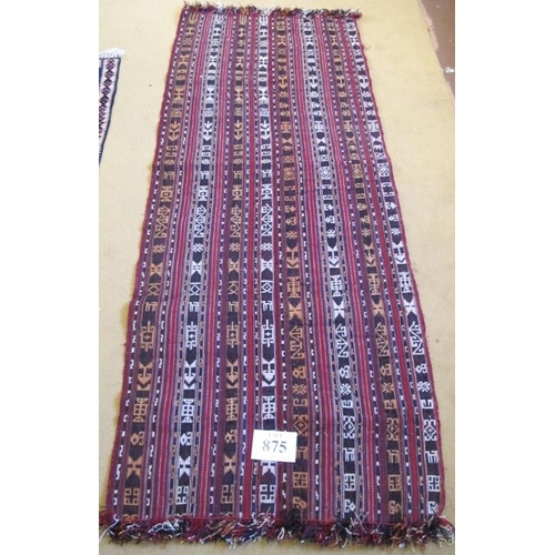 875 - A 20th Century Kilim rug, repeat pattern stripe in brown, cream and red. 225cm x 79cm approx.
Condit... 