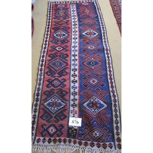 876 - A 20th Century Kilim rug. Pink, blue and cream stripe with reverse pattern. 207cm x 78cm approx.
Con... 