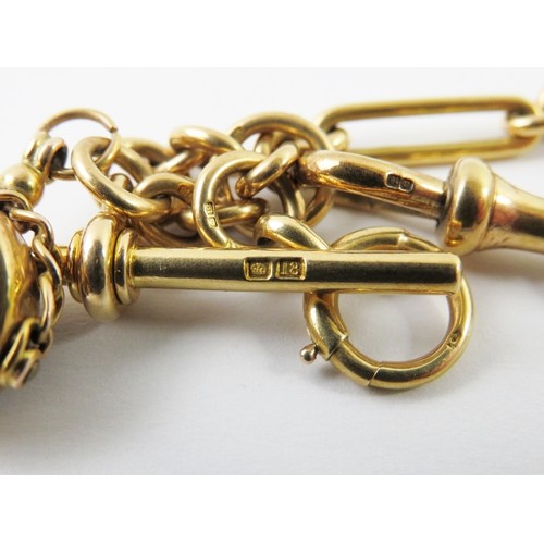 449 - An 18ct yellow gold watch chain, formed with long and short links, to a bolt and claw clasp, 39cm lo... 