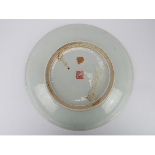 53 - A Chinese famille rose mille fleur charger, 19th century. Profusely decorated with overglaze enamels... 