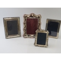 Four silver mounted easel back phot frames of various style and size ...